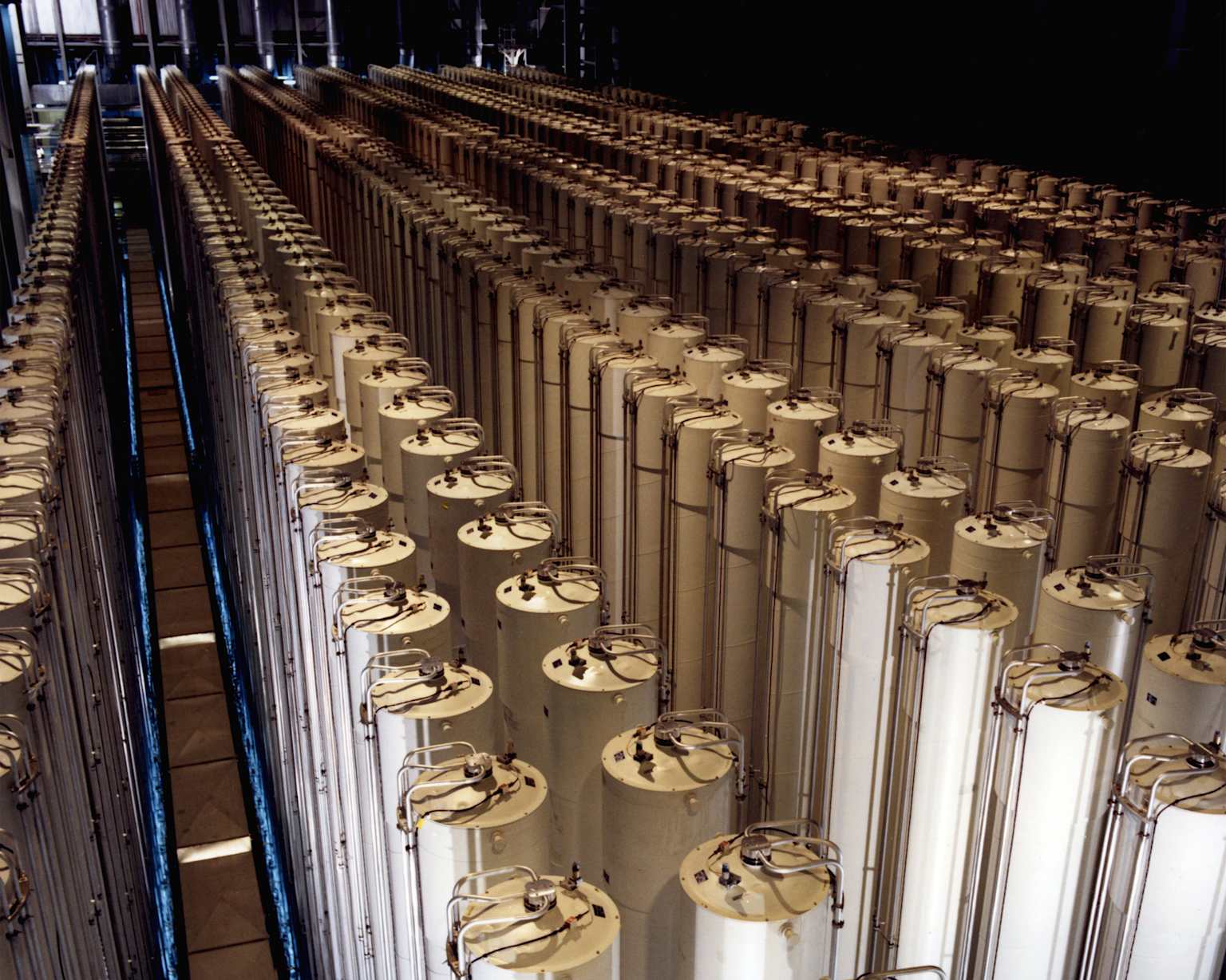 A large array of gas centrifuges arranged in rows within a facility, typical for uranium enrichment.