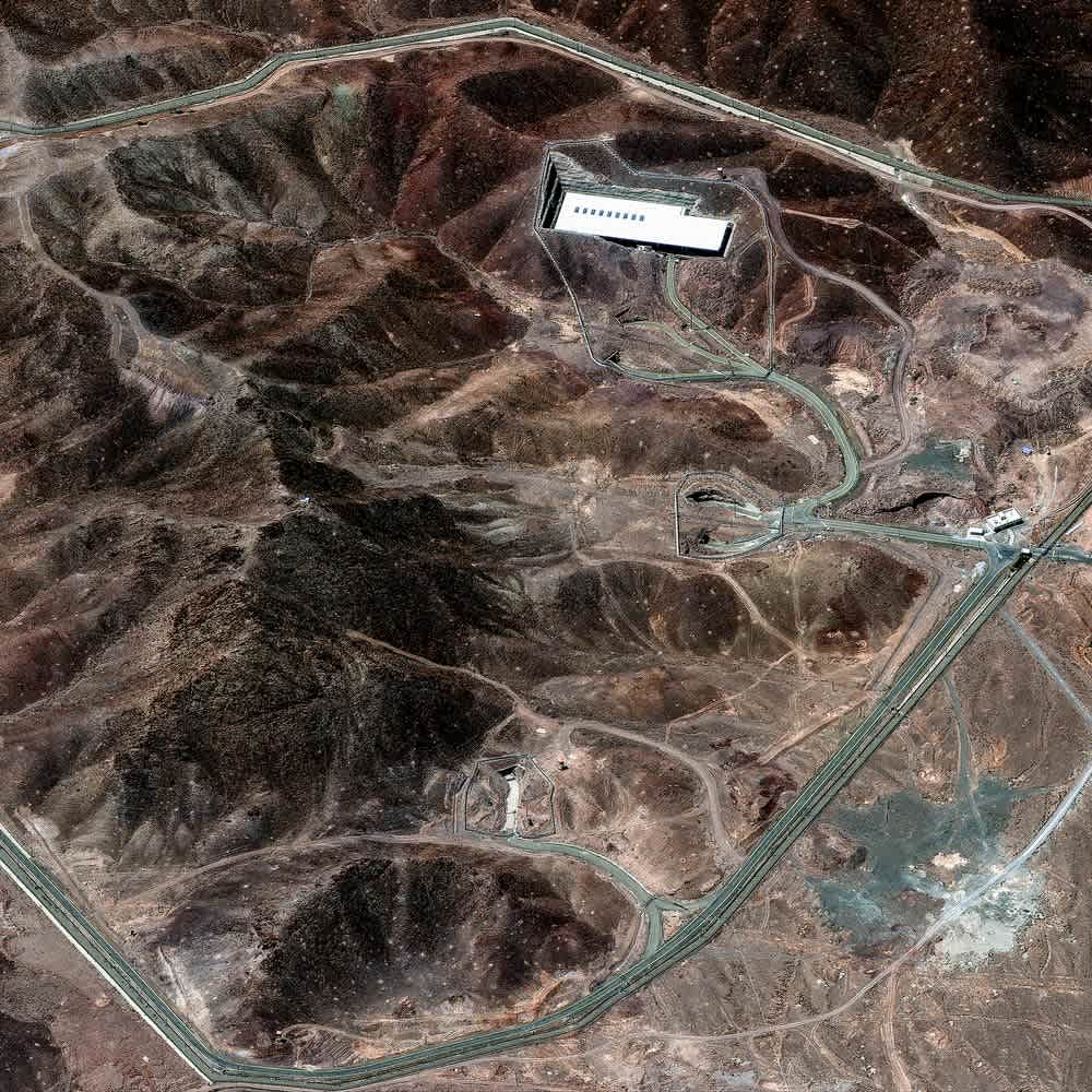 Satellite image of the Fordow Fuel Enrichment Plant (FFEP) showing its primary structures and surrounding access roads.