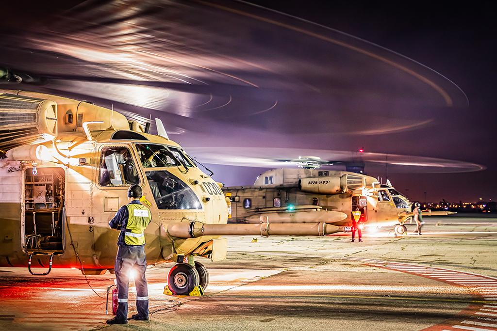 Israeli Air Force CH-53 helicopters prepare for a night operation.