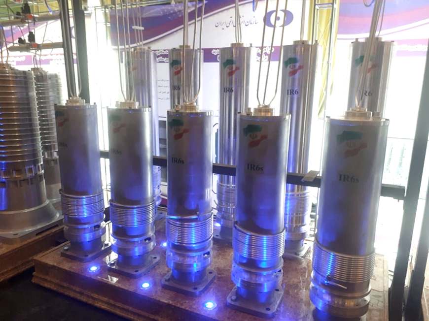 Rows of advanced Iranian IR-6 and IR-6s centrifuges on display, showcasing their design.
