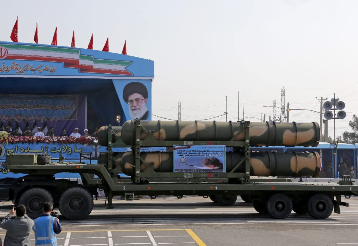 Iranian S-300 air defense system missile launchers on parade, showcasing a key component of the nation's strategic defenses.